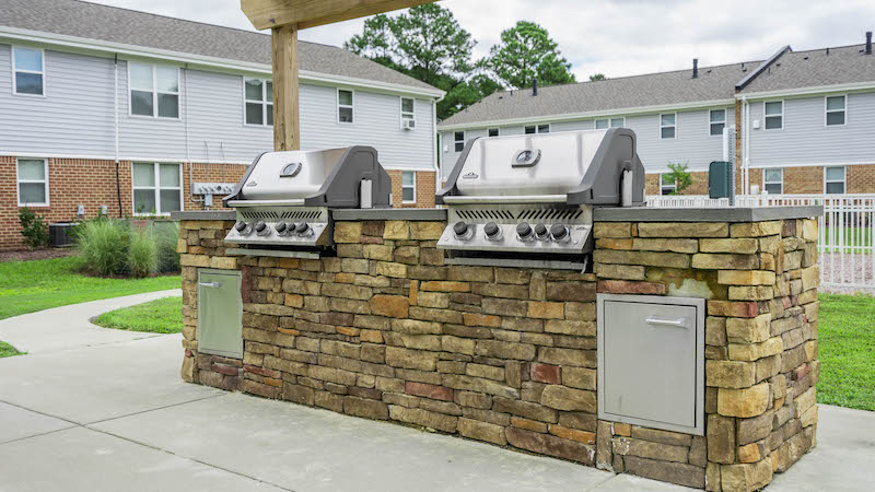 two community grills set in stone